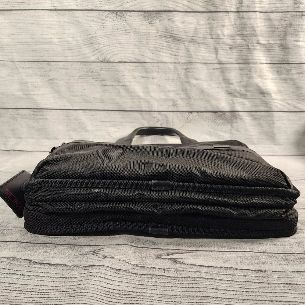 Tumi pre owned